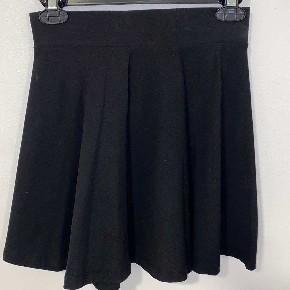 16 in black mini skirt